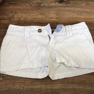 Red camel white shorts